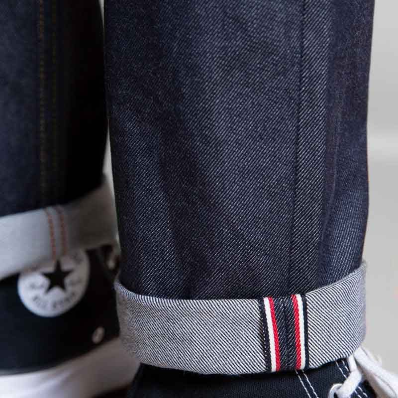 Detail ourlet selvedge jeans femme selvedge brut taille haute 14oz regular de qualité