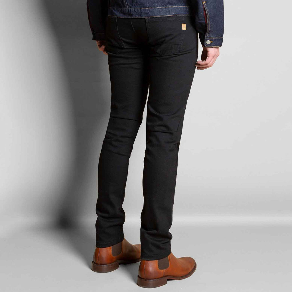 Vue de profil dos jeans dao homme noir demi slim elasthane made in france